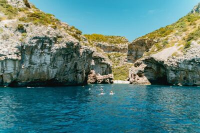 Blue Cave & 6 Islands Speedboat Tour From Split or Podstrana - Komiža on Vis: a fishing village break before the swim stops