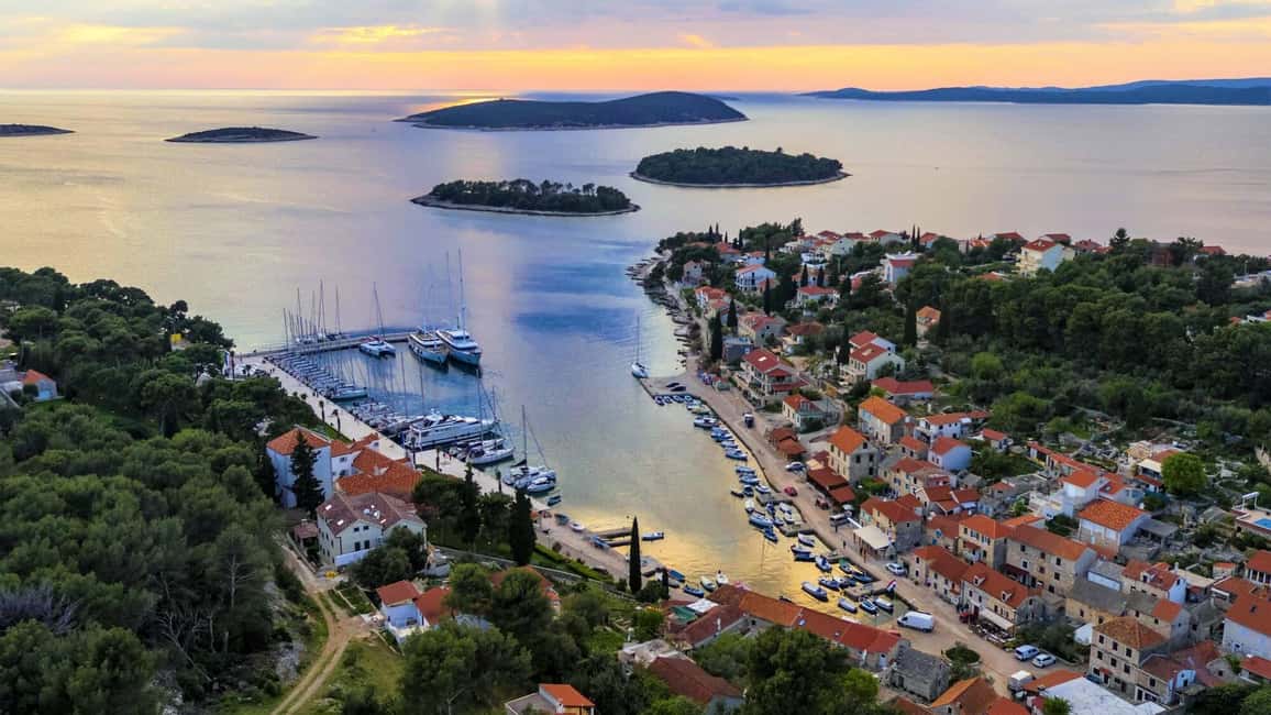 From Split: Blue Lagoon and 3 Island Boat Tour - Blue Lagoon at Krknjaši Bay: the clearest start to your day