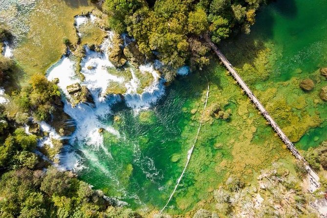 From Split: Krka Waterfalls Trip with Boat Cruise and Swimming - Primošten Beach Stop: Where the Swimming Time Happens