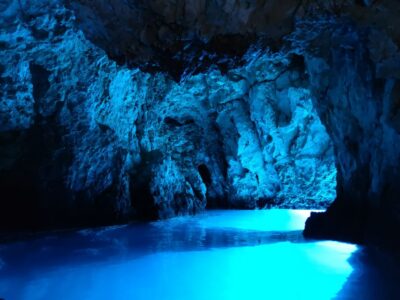 From Split: Luxury Cabin Boat Tour to The Blue Cave and Hvar - Entering the Blue Cave at Bisevo (duck-and-go)