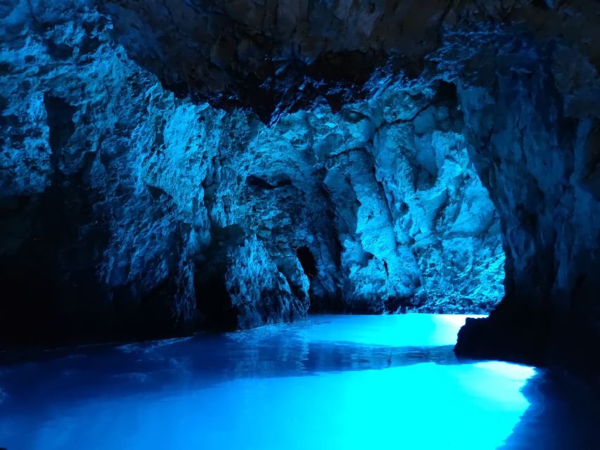 From Split: Luxury Cabin Boat Tour to The Blue Cave and Hvar - Entering the Blue Cave at Bisevo (duck-and-go)