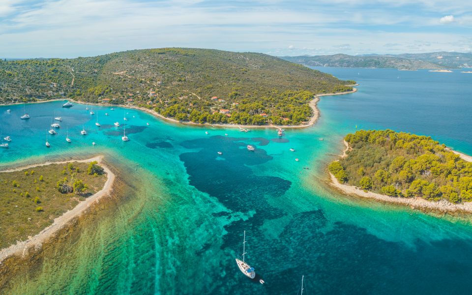 From Split: Trogir & Blue Lagoon Boat Tour with Snorkeling - Ciovo Bay Pine Forest and Secluded Pebble Beach Views