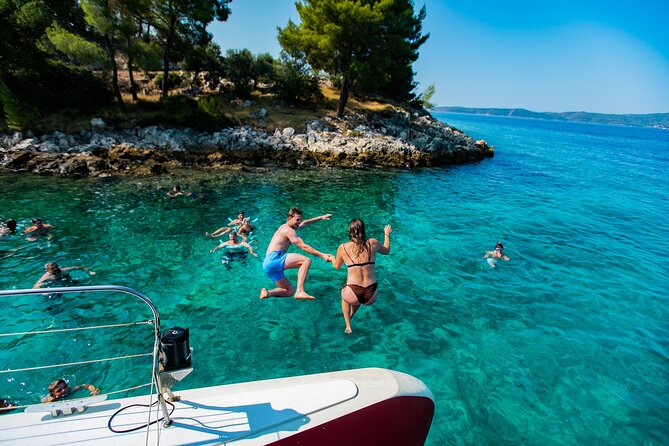 Full-Day Catamaran Cruise to Hvar & Pakleni Islands with Food and free Drinks - Pakleni Islands Swim Stop: Hidden Bays and Open-Bar Energy