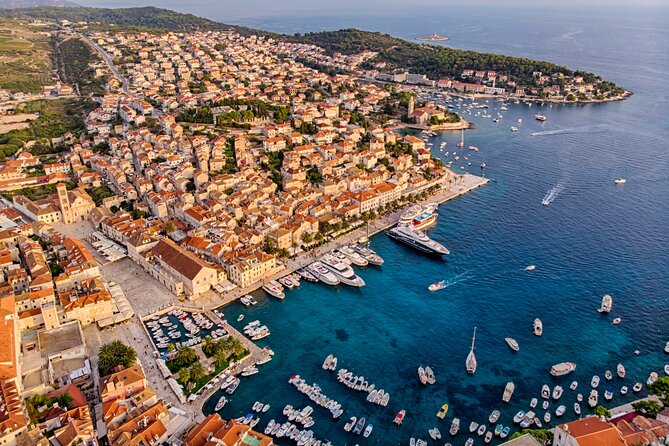 Full-Day Catamaran Cruise to Hvar & Pakleni Islands with Food and free Drinks - Solta Island on the Way Back: Fruit, Cakes, and a Deck Party Ending