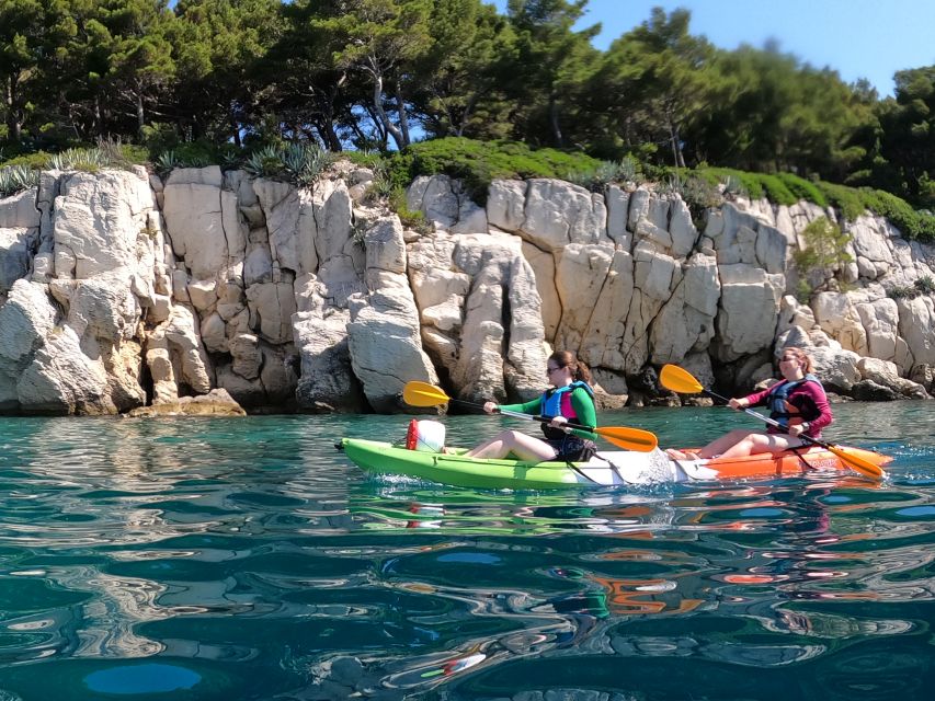 Morning Split Sea Kayaking Tour - The ride back: calmer paddle with sunset light and guide photos