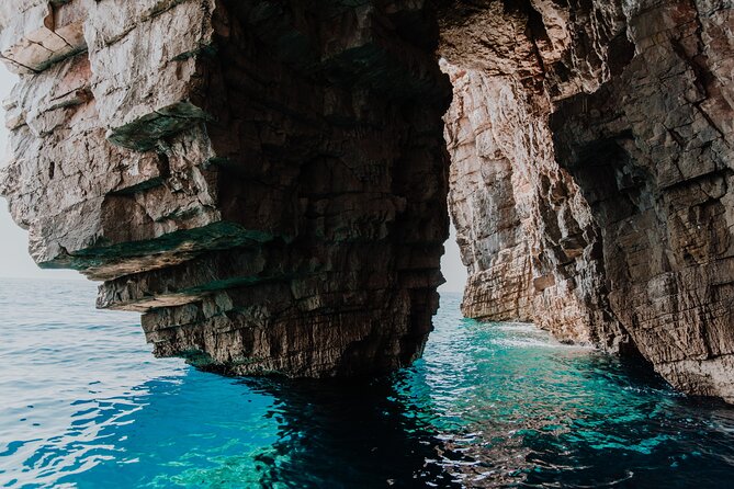 Private Blue cave, Mamma Mia and Hvar, 5 islands tour from Split - Budikovac Island Blue Lagoon: masks, snorkels, and a donkey cameo