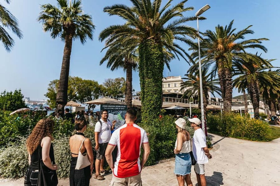 Split: Diocletian Palace & Old Town Guided Walking Tour - Finding the tour at Apodos and the red bus clue