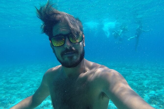 Two Islands Blue Lagoon Half-Day Boat Tour from Split - Stop 1: Blue Lagoon / Krknjasi Bay for a Full Hour in the Water