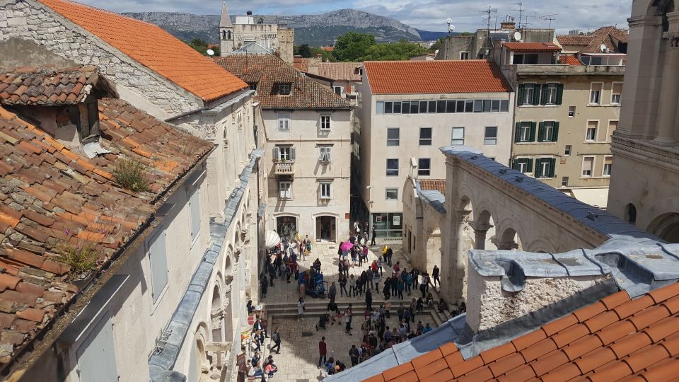 Walking Tour Split - Golden Gates and Grgur Ninski statue—human scale in stone
